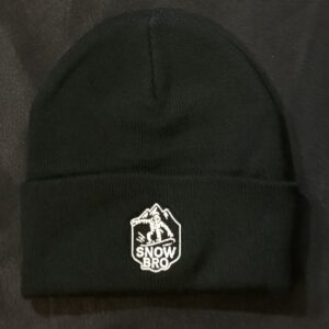 Black knit beanie with a white embroidered logo on the cuff.